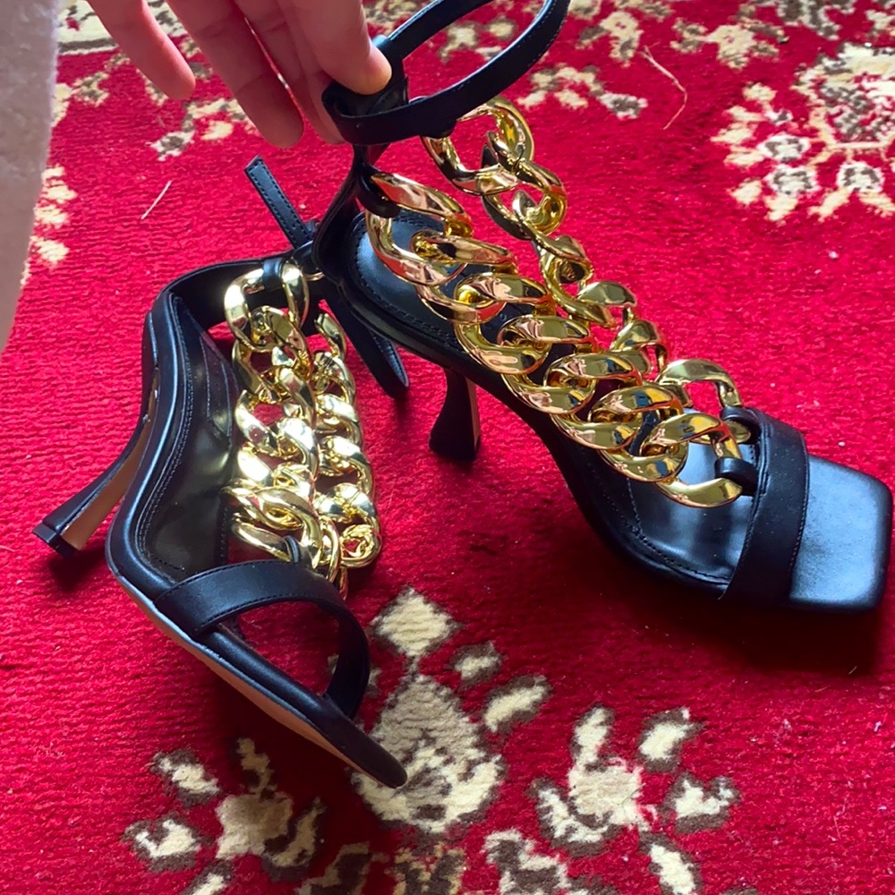Never worn before black gold heel